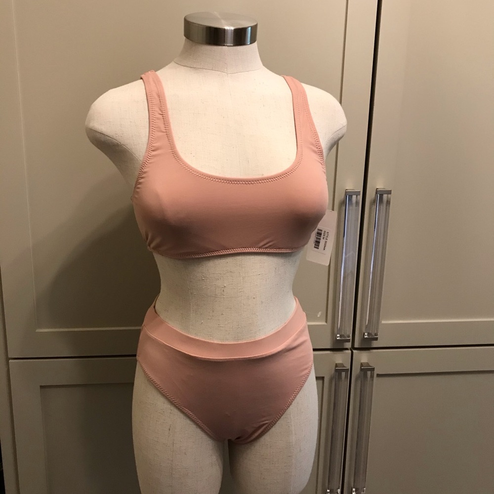 Envya swimsuit with tags tried on too small